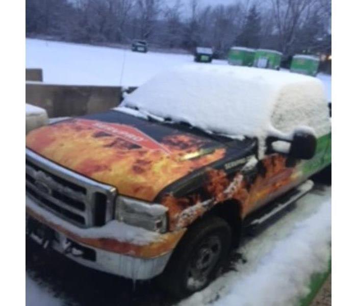 SERVPRO vehicles covered in snow